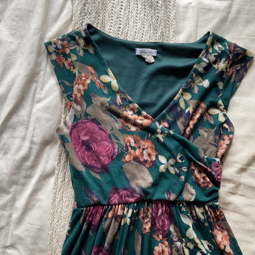 Emerald green nursing friendly floral dress.